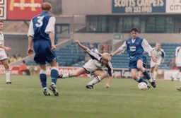 Gary Waddock takes a tumble