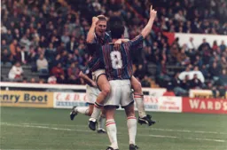 Julain James celebrates his goal