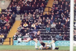 John Hartson goes close