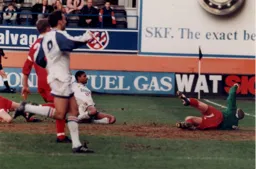 Dwight Marshall slides in the Town's second goal