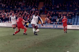 Mitchell Thomas clips the ball down the line