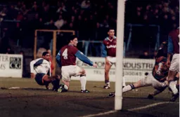 Dwight Marshall fires the Town ahead watched by Burnley's Steve Davis