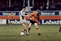 John Taylor tries to get the better of Mark Venus