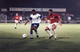 Dwight Marshall shields the ball from Neil Young