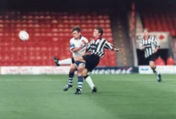 Graham Alexander is beaten to the ball