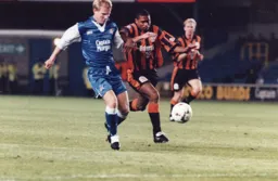 Dwight Marshall in a race for the ball