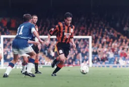 Ceri Hughes surges through midfield