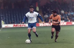 Darren Patterson tries to get down the line