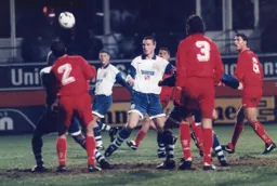 Steve Davis watches a header go wide