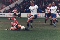 David Oldfield attempts to win the ball