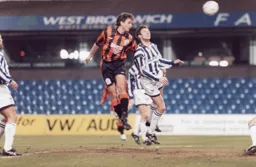 Bontcho Guentchev heads in the Town's first goal