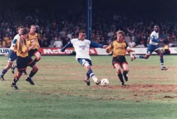 Kim Grant surely has the speed to get around Andy Hessenthaler