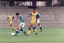 Des Linton forces the Rovers player away