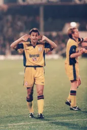 Bontcho and Gary Waddock celebrate taking the Premiership scalp