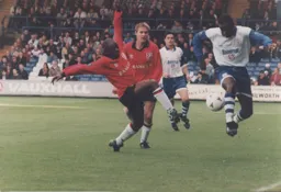 Mitchell Thomas makes a break for the Hatters