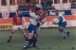 Tony Thorpe in action again, he later left the field on a stretcher, with a wink, after getting a red card for a Crewe player
