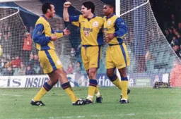 Thorpe celebrates his usual goal with Linton and Marshall