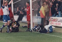 David Oldfield celebrates another with help from Mitchell Thomas