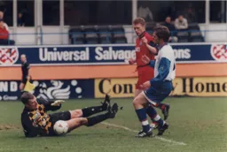 No way through for Alexander as his future manager David Moyes watches on in his Manchester United mode