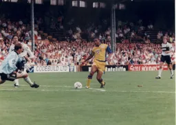 Former Town youth keeper Mark Walton closes in to block Dwight Marshall