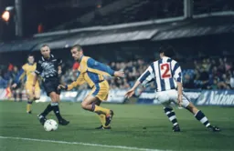 Simon Davies sends Andy McDermott the wrong way