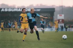 Keith Ryan blocks Phil Gray`s route to goal