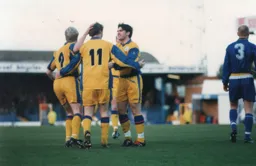 David Oldfield and Tony Thorpe congratulate Graham Alexander after he scored Town`s first goal