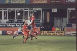 Steve Davis gets up for a header