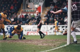 Mitchell Thomas stoops to head the Town level