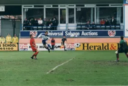 Phil Gray swoops to head in Town`s third goal