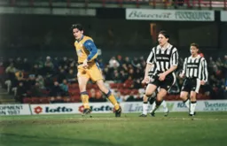 Rory Allen watches his shot on the way to the goal