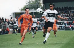 Matthew Spring chasing down Chris Coleman