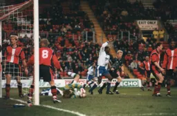 Mitchell Thomas celebrates the equaliser from Phil Gray