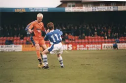 Graham Alexander challenging for the ball
