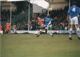 Matthew Spring moves the ball forward