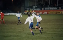 Sean Evers gets a high five from Matthew Spring after scoring the second