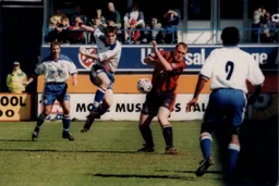 Phil Gray looks on while Tony Thorpe takes a shot