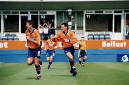 McLaren, Fraser and the other goalscorer Matthew Spring celebrate