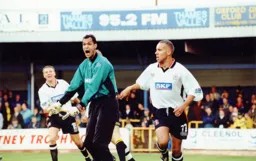 Oxford keeper is unhappy as Liam sheepishly turns away and Taylor prepares to celebrate