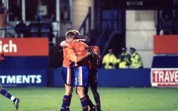 Celebrations for a Doherty goal so of course Matther Taylor is there