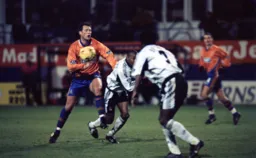 P931Paul McLaren loses the ball but wins for being the only Hatter in these match photos not wearing gloves