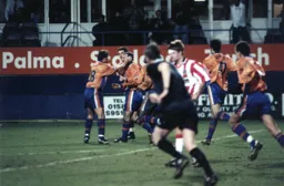Phil Gray ignores the Stoke protests as his teammates mob him. The referee is not hanging around either