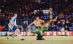 Matty Taylor gets into the penalty box again but this time Fortress Kenny means the Bury keeper Paddy