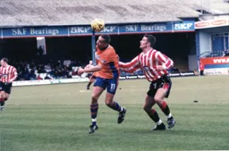 Liam George battles away but the Bees take the sting out of this attack as they take all three points back to London