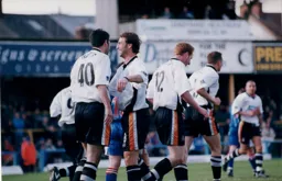 Adam Locke finally catches up to join in as the rest of the team prepare for the restart