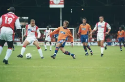 Peter Holmes moves in to challenge future Hatter Kevin Watson