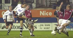 Liam George fires a shot at goal