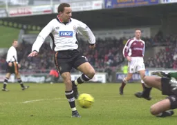 Liam George threatens the Northampton goal