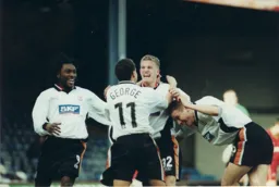 Liam George is first to congratulate Lee Mansell after opening the scoring