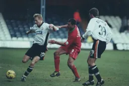 Petri Helin is closed down by Giovanni Savarese